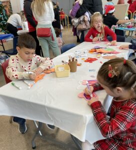 Snowflake Social 2025 - Children crafting